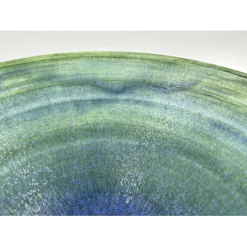 375 - A Mary Rich studio pottery circular footed fruit bowl with teal and apple green matt glaze - approx.... 