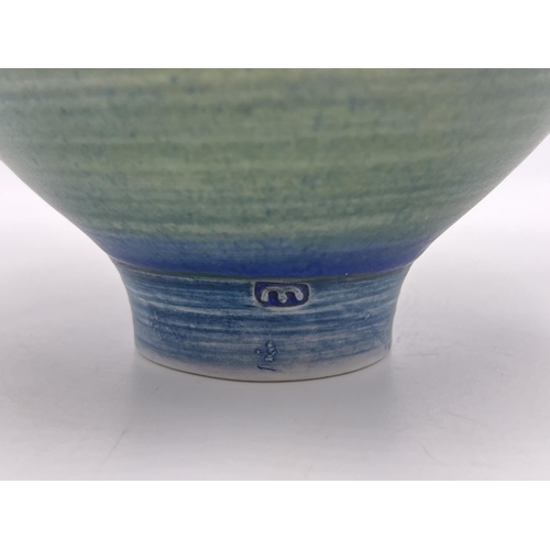 376 - A Mary Rich studio pottery circular footed bowl with teal and apple green matt glaze - approx. 16.5c... 