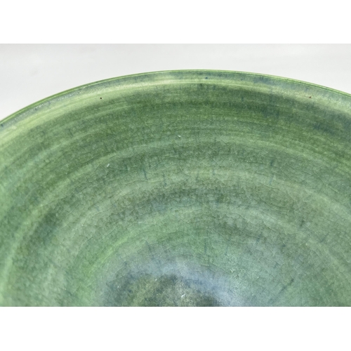 376 - A Mary Rich studio pottery circular footed bowl with teal and apple green matt glaze - approx. 16.5c... 