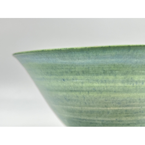 376 - A Mary Rich studio pottery circular footed bowl with teal and apple green matt glaze - approx. 16.5c... 