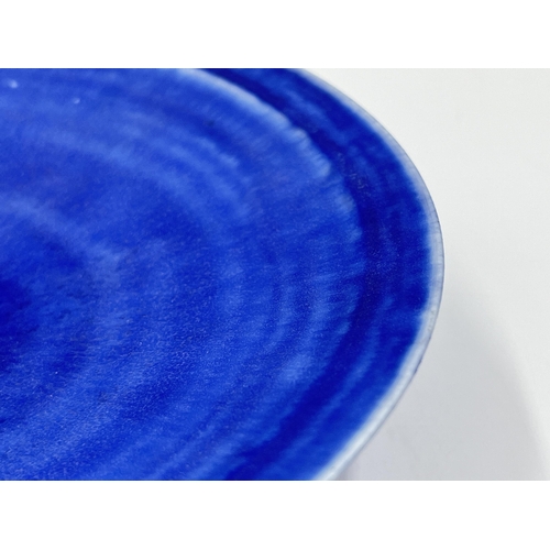 377 - A Mary Rich studio pottery circular footed dish with ultramarine and teal glaze - approx. 20.5cm dia... 