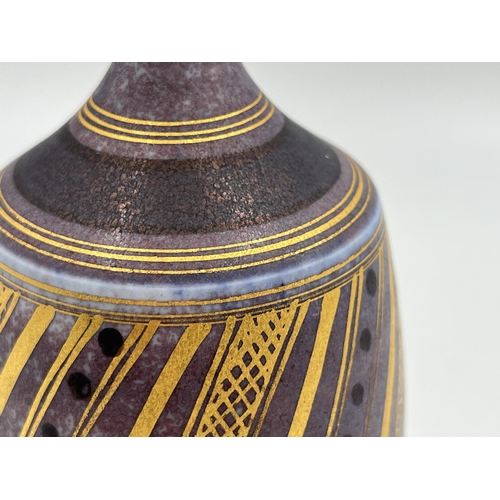 378 - A Mary Rich studio pottery solifleur vase on damson ground with gilt geometric pattern - approx. 17.... 