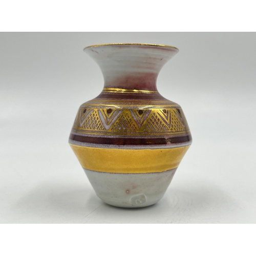 381 - A Mary Rich studio pottery vase with gilt geometric pattern - approx. 7cm high