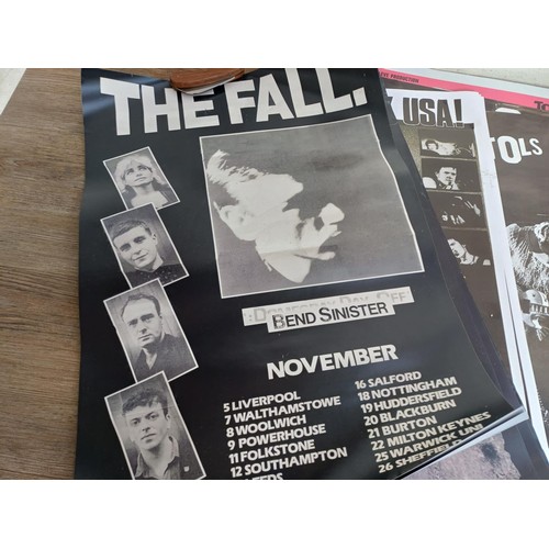 781 - A collection of reproduction music posters to include The Fall, The Jam, Sex Pistols, The Damned, Ni... 