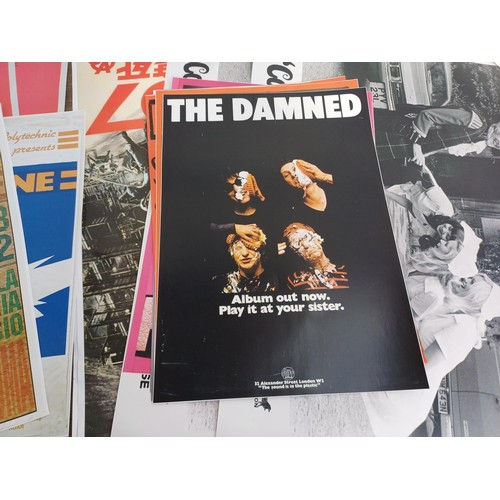 781 - A collection of reproduction music posters to include The Fall, The Jam, Sex Pistols, The Damned, Ni... 