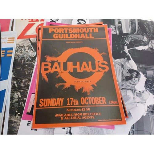 781 - A collection of reproduction music posters to include The Fall, The Jam, Sex Pistols, The Damned, Ni... 