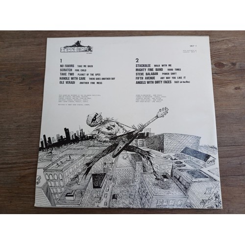 784 - A 1990 'Rock The City' compilation LP vinyl record with booklet featuring No Favors, Angels With Dir... 