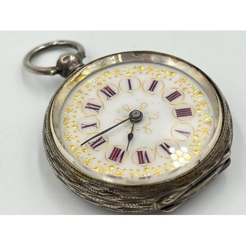 2306 - A late 19th century Swiss .935 silver open face key wind pocket watch with enamel hand finished dial... 