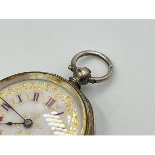 2306 - A late 19th century Swiss .935 silver open face key wind pocket watch with enamel hand finished dial... 