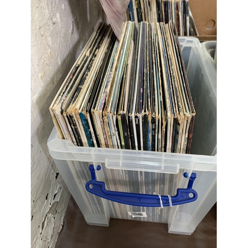 759 - Three boxes containing a collection of vinyl records to include Dire Straits, Bob Dylan, Japan, The ... 