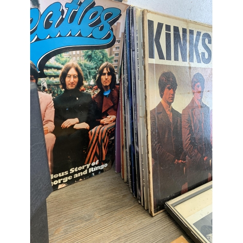 776 - A box containing The Beatles hardback book, 7