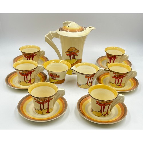 382 - A Clarice Cliff Coral Firs pattern fifteen piece coffee set comprising six cups, six saucers, coffee... 