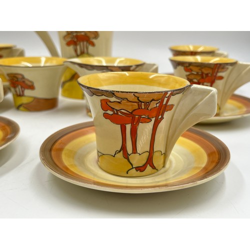 382 - A Clarice Cliff Coral Firs pattern fifteen piece coffee set comprising six cups, six saucers, coffee... 