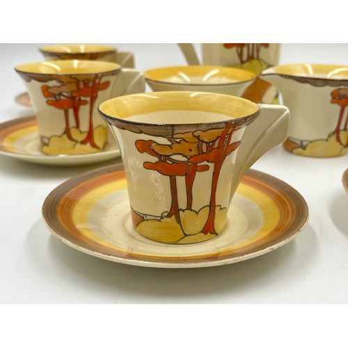 382 - A Clarice Cliff Coral Firs pattern fifteen piece coffee set comprising six cups, six saucers, coffee... 