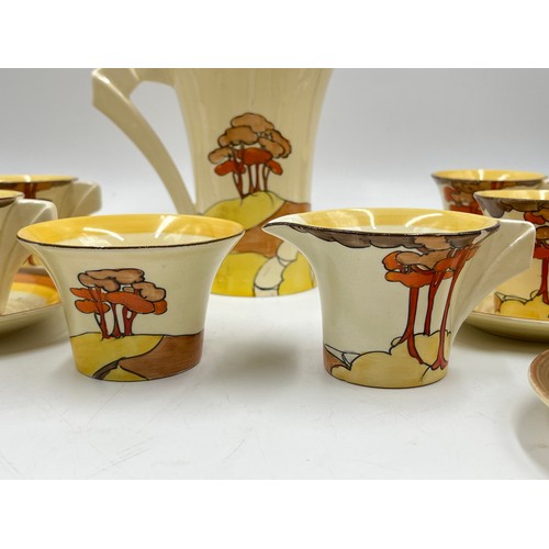 382 - A Clarice Cliff Coral Firs pattern fifteen piece coffee set comprising six cups, six saucers, coffee... 