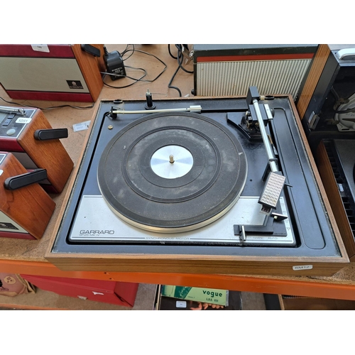 742 - Three items, one Garrard SP25 Mk. IV four-speed turntable with instruction manual and spare shure M7... 