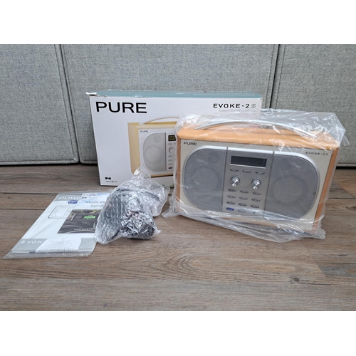 747 - A boxed Pure Evoke-2S DAB/FM radio with instruction manual