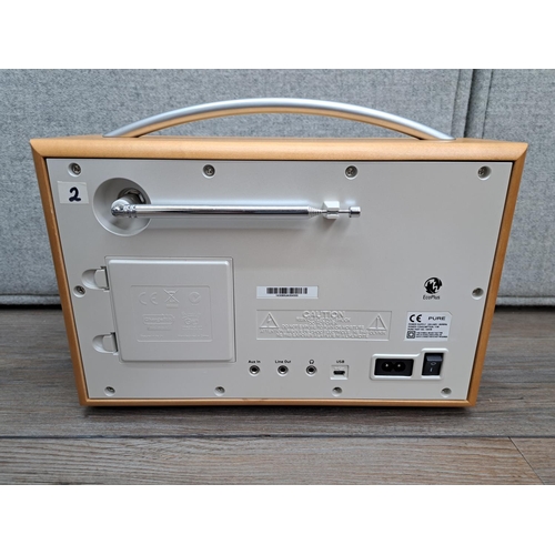 747 - A boxed Pure Evoke-2S DAB/FM radio with instruction manual