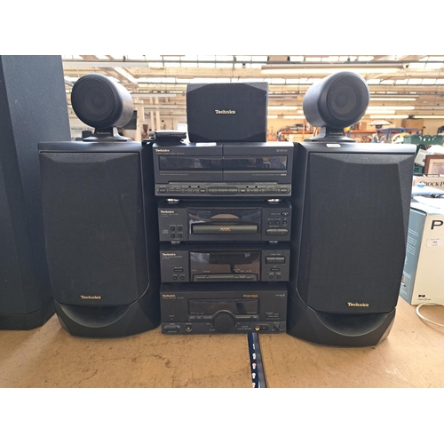 750 - A Technics hi-fi system comprising RS-CH770 Dolby B twin cassette deck, SL-CH570 CD player, ST-CH570... 