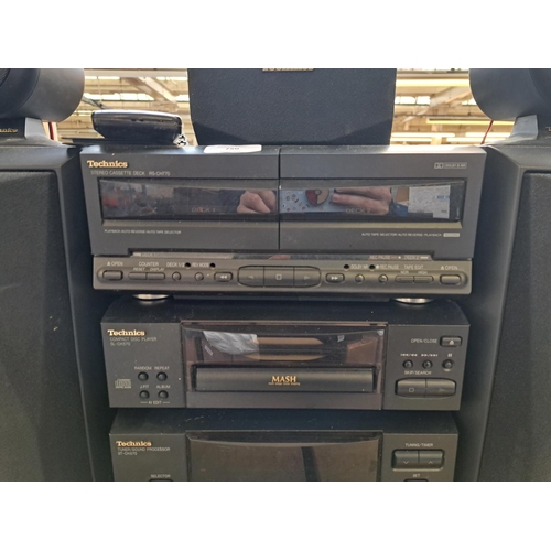 750 - A Technics hi-fi system comprising RS-CH770 Dolby B twin cassette deck, SL-CH570 CD player, ST-CH570... 