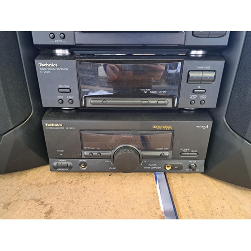 750 - A Technics hi-fi system comprising RS-CH770 Dolby B twin cassette deck, SL-CH570 CD player, ST-CH570... 