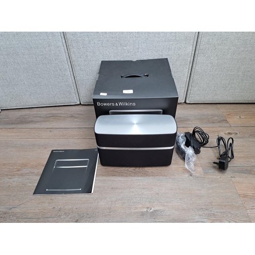 751 - A boxed Bowers & Wilkins A5 wireless music system with power adaptor, remote control and instruction... 