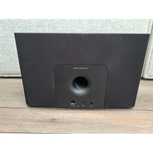 751 - A boxed Bowers & Wilkins A5 wireless music system with power adaptor, remote control and instruction... 