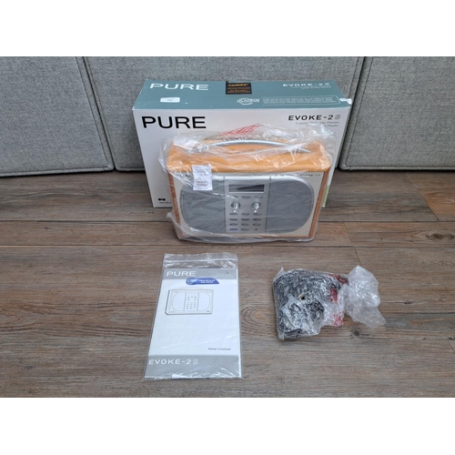 754 - A boxed Pure Evoke-2S DAB/FM radio with instruction manual