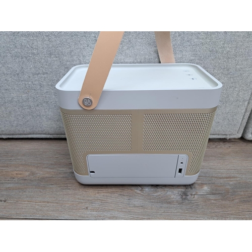 755 - A boxed Bang & Olufsen Beolit 15 Bluetooth speaker with power cable and instruction manual