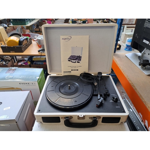 757 - Two portable record players, one vintage Dansette Products Ltd. Bermuda four-speed autochanger and o... 