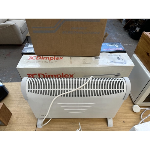 856 - Four items, two boxed Dimplex electric convector heaters, one Glen convector heater and one boxed Ki... 