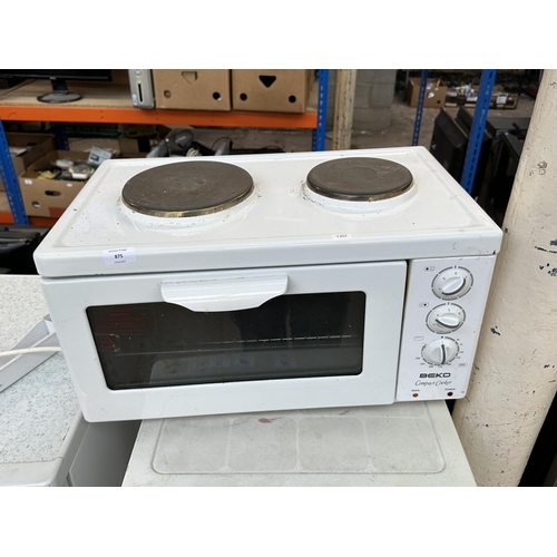 875 - A Beko counter top compact electric cooker comprising two burner hob and oven