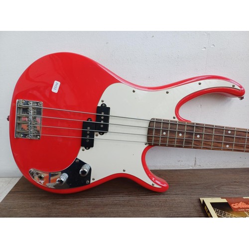 786 - A Peavey Zodiac EX electric bass guitar with two sets of Alice .095-.040 strings