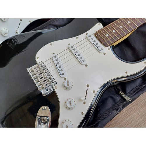 788 - Four items, three Stratocaster style electric guitars to include cased Encore Blaster Series and one... 