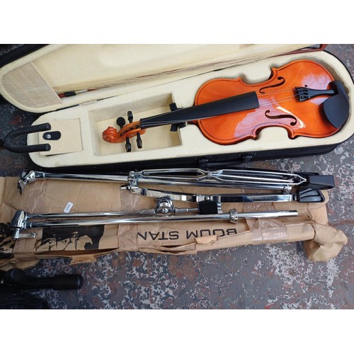 789 - Four items, one Stagg cello stand, one cased full size student violin, one boxed Mapex boom cymbal s... 