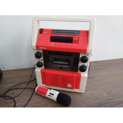 795 - Three items, one MS-15G 15w guitar amplifier, one The Singing Machine SMT-15 AM/FM radio/cassette re... 