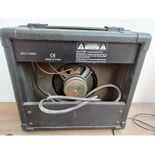 795 - Three items, one MS-15G 15w guitar amplifier, one The Singing Machine SMT-15 AM/FM radio/cassette re... 