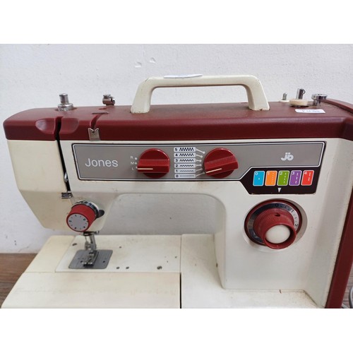 860 - Two items, one Jones VX710 electric sewing machine with foot pedal and one Singer Mini Mender Handy ... 