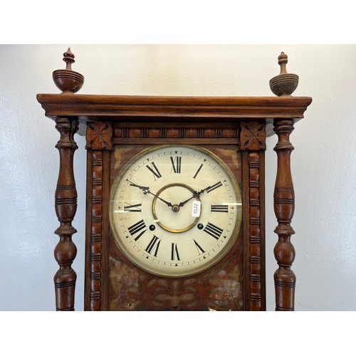 570 - A Victorian carved oak chiming wall clock - approx. 98cm high x 40cm wide