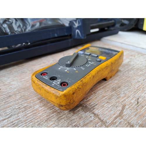 960A - A Fluke 115 true RMS multi-meter