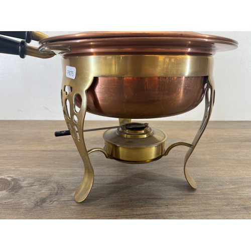 458 - A late 19th/early 20th century copper and brass chafing dish - approx. 30cm high