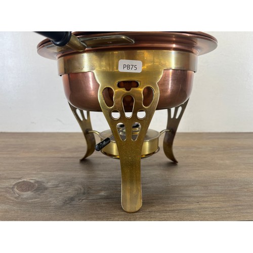 458 - A late 19th/early 20th century copper and brass chafing dish - approx. 30cm high