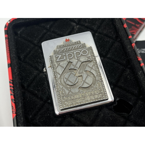 2023A - Two boxed Zippo windproof Commemorative cigarette lighters, one The Varga Girl and one 65th Annivers... 