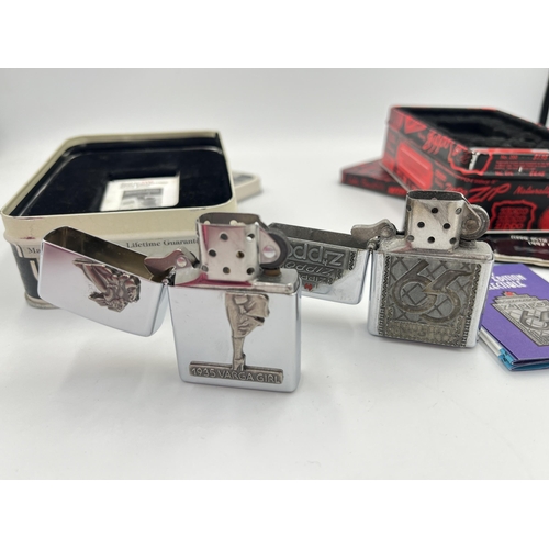 2023A - Two boxed Zippo windproof Commemorative cigarette lighters, one The Varga Girl and one 65th Annivers... 