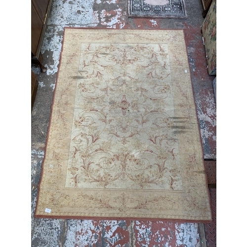 153 - A Laura Ashley Home cotton and wool rug - approx. 167cm x 116cm