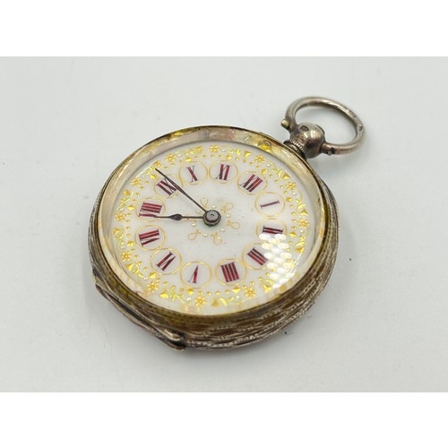 2306 - A late 19th century Swiss .935 silver open face key wind pocket watch with enamel hand finished dial... 