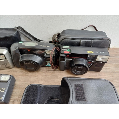 610 - Ten Pentax compact 35mm cameras to include Espio 105G, boxed and cased Pino 35, two Espio 928, Zoom ... 