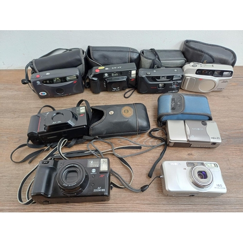 612 - Eight Minolta compact cameras to include Riva Zoom 160, Riva Zoom 70, AF-E II, AF-DL etc.