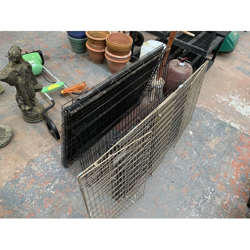 1022 - Three items, two dog crates and one metal fire guard