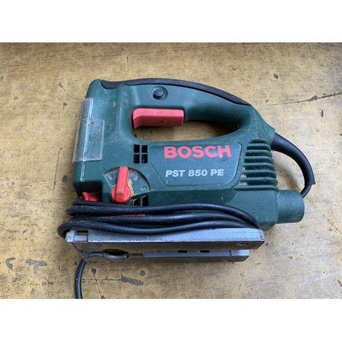 981 - A collection of Bosch power tools to include PST 850 PE jigsaw, PBS7A belt sander, CSB 520-2E corded... 